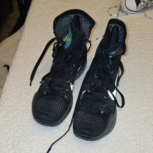 Nike Black High-Top Athletic Sneakers with Green Accent